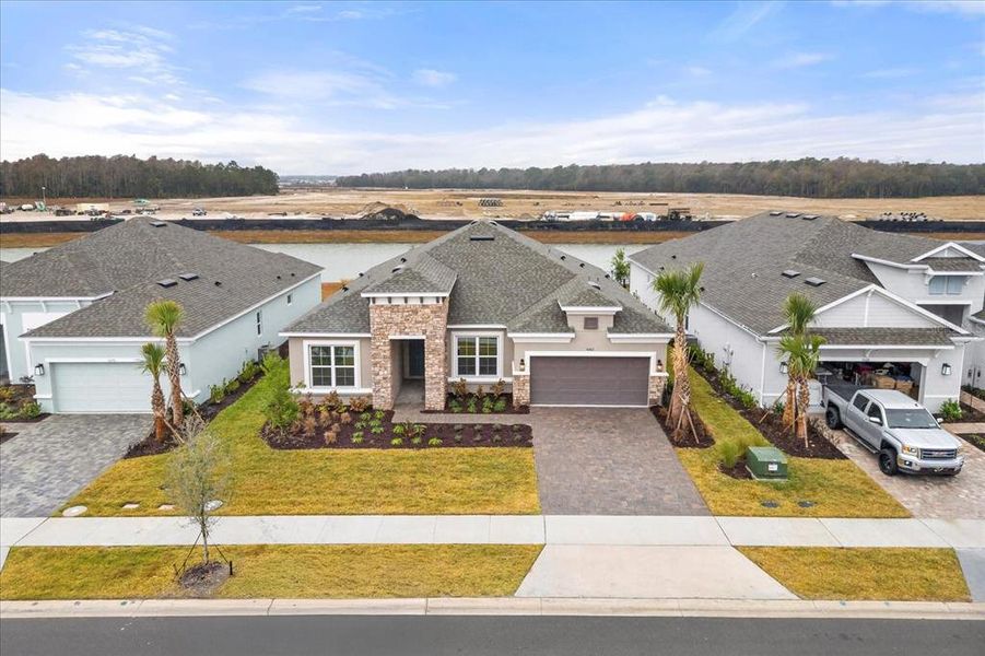 Front exterior of a new home in , Kissimmee, FL, highlighting curb appeal (Image 1). Front exterior of a new home in , Kissimmee, FL, highlighting curb appeal (Image 1).