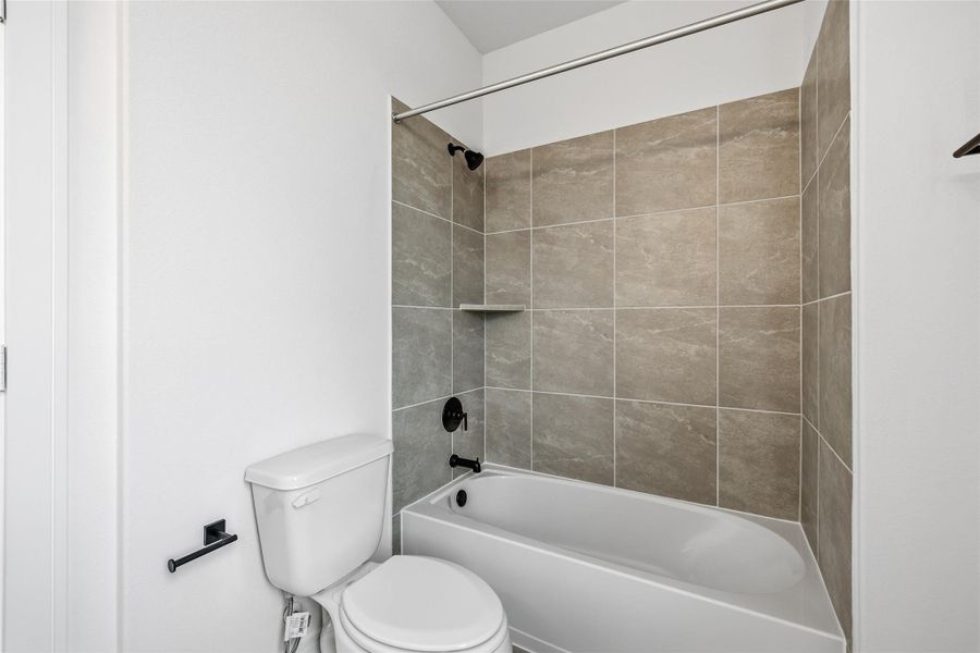 Furnished interior view inside a new home in Bridgeland Central, Cypress (Image 16).