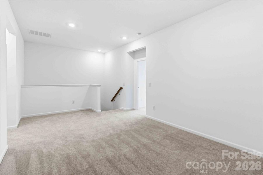 Spacious, unfurnished interior of a new home in Ridge at Sugar Creek, Indian Land (Image 30).
