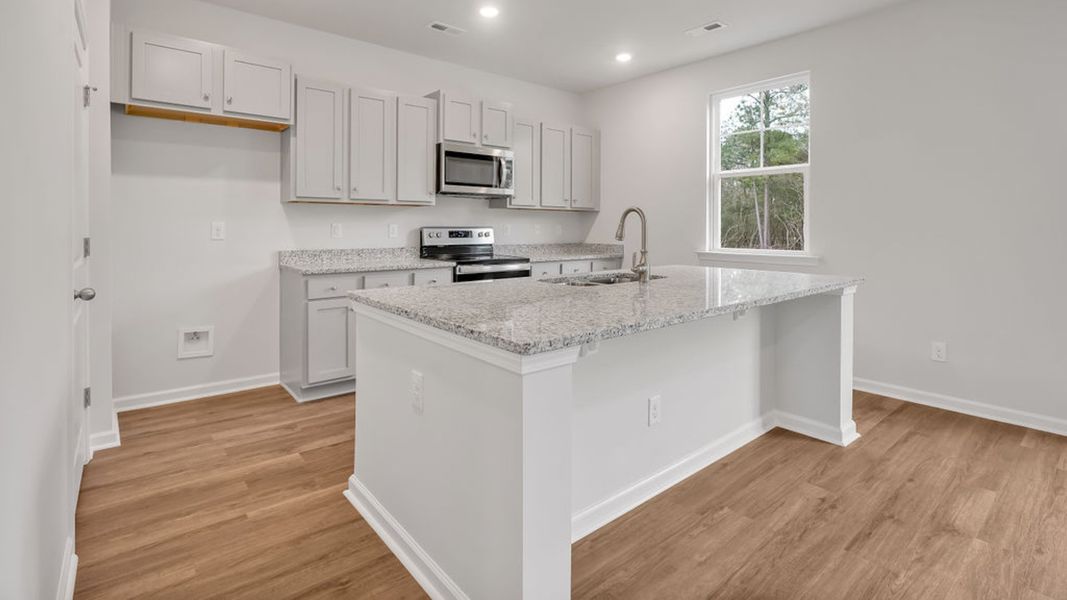 Furnished interior view inside a new home in Grayson Park, Leland (Image 7).