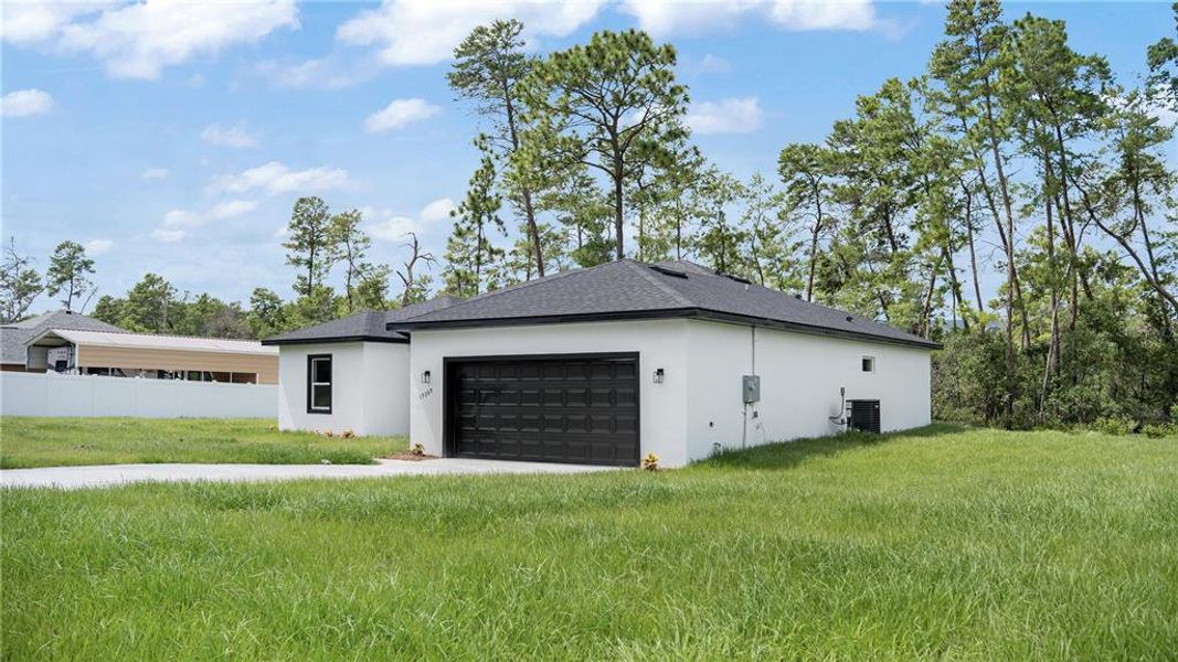 Front exterior of a new home in , Ocala, FL, highlighting curb appeal (Image 25).