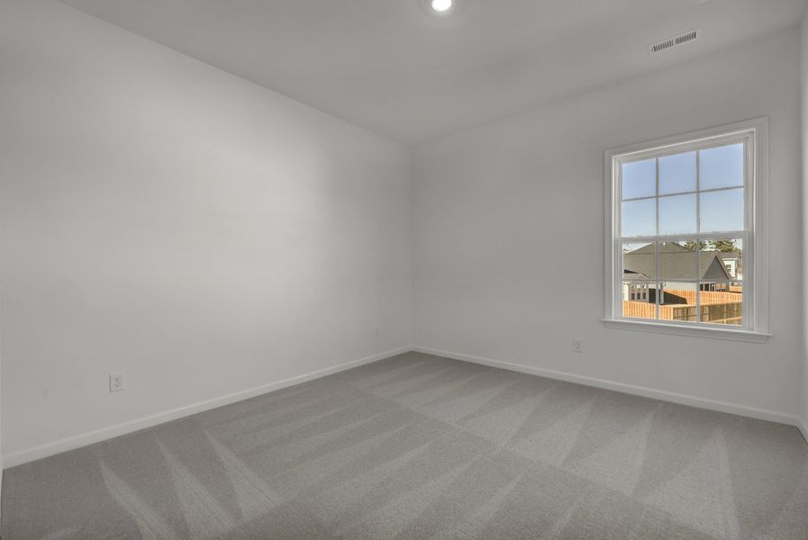 Spacious, unfurnished interior of a new home in Grand Park, Leland (Image 30).