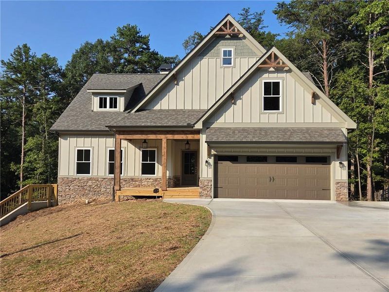 Front exterior of a new home in , Waleska, GA, highlighting curb appeal (Image 1).