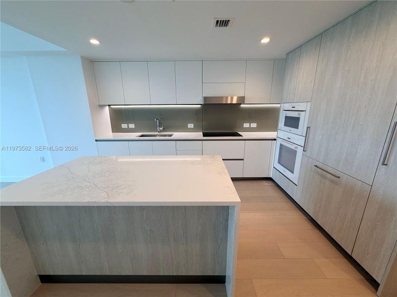 Furnished interior view inside a new home in , Bay Harbor Islands (Image 4). Furnished interior view inside a new home in , Bay Harbor Islands (Image 4).