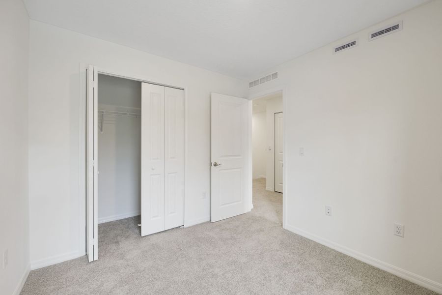 Spacious, unfurnished interior of a new home in Towns at Riverwalk, Sanford (Image 28).
