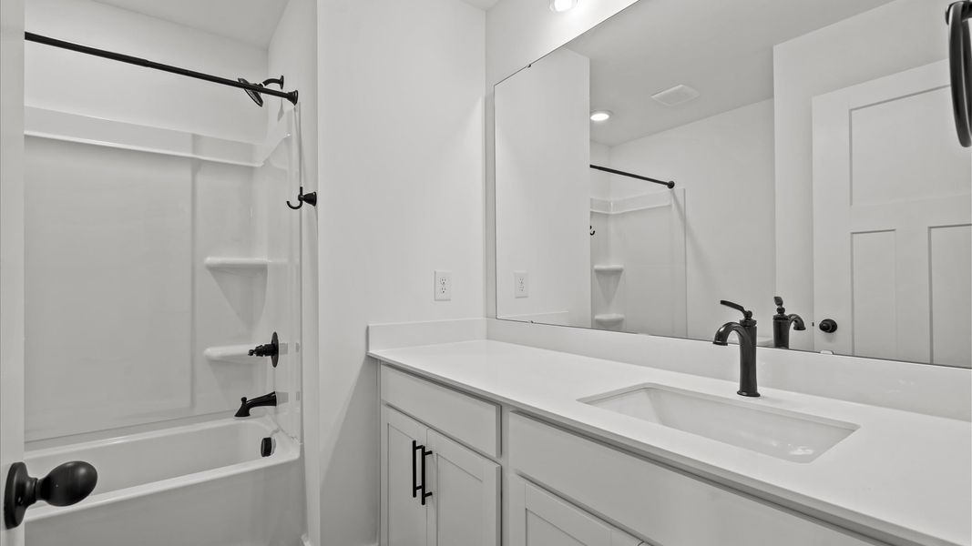 Stylish guest bathroom with superior design and thoughtful storage solutions