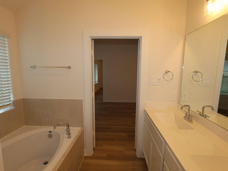 Furnished interior view inside a new home in Pinewood at Grand Texas, New Caney (Image 6).