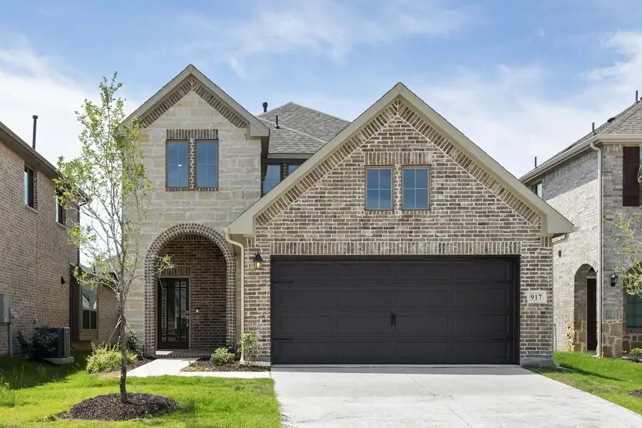 Representative exterior photo of a completed home built from the Archer by Pacesetter Homes in The Reserve at Spiritas Ranch, Little Elm, TX (Image 2). Representative exterior photo of a completed home built from the Archer by Pacesetter Homes in The Reserve at Spiritas Ranch, Little Elm, TX (Image 2).