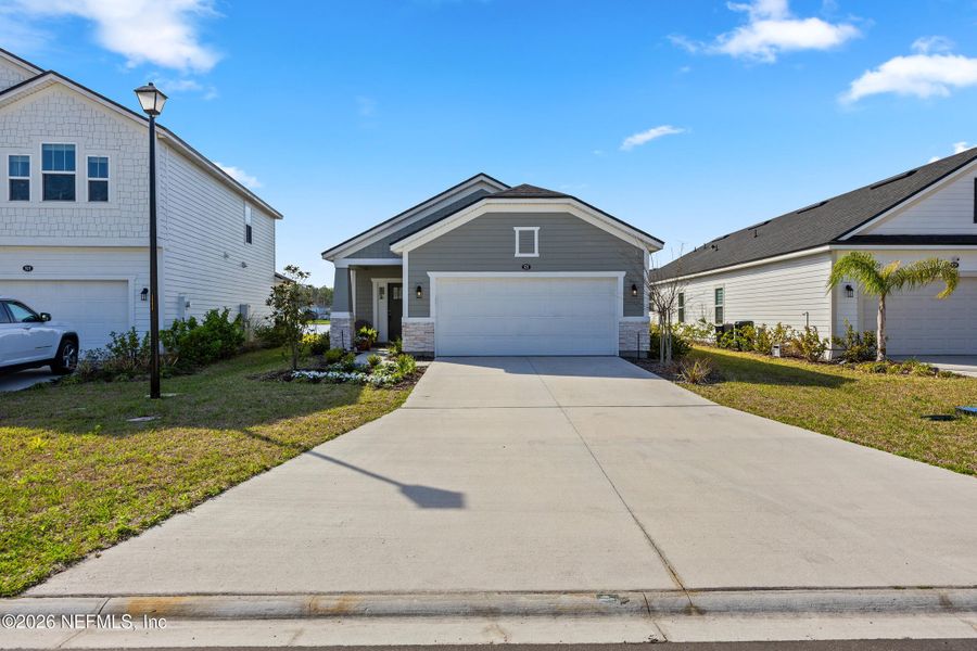 Front exterior of a new home in , St. Augustine, FL, highlighting curb appeal (Image 22).