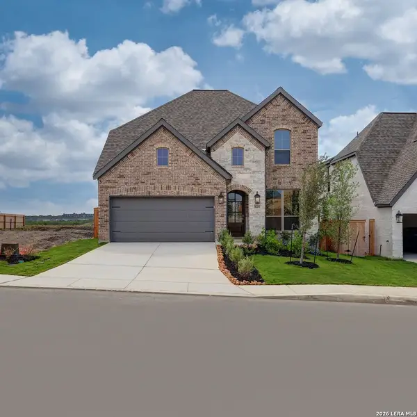 Front exterior of a new home in Briggs Ranch, San Antonio, TX, highlighting curb appeal (Image 2).