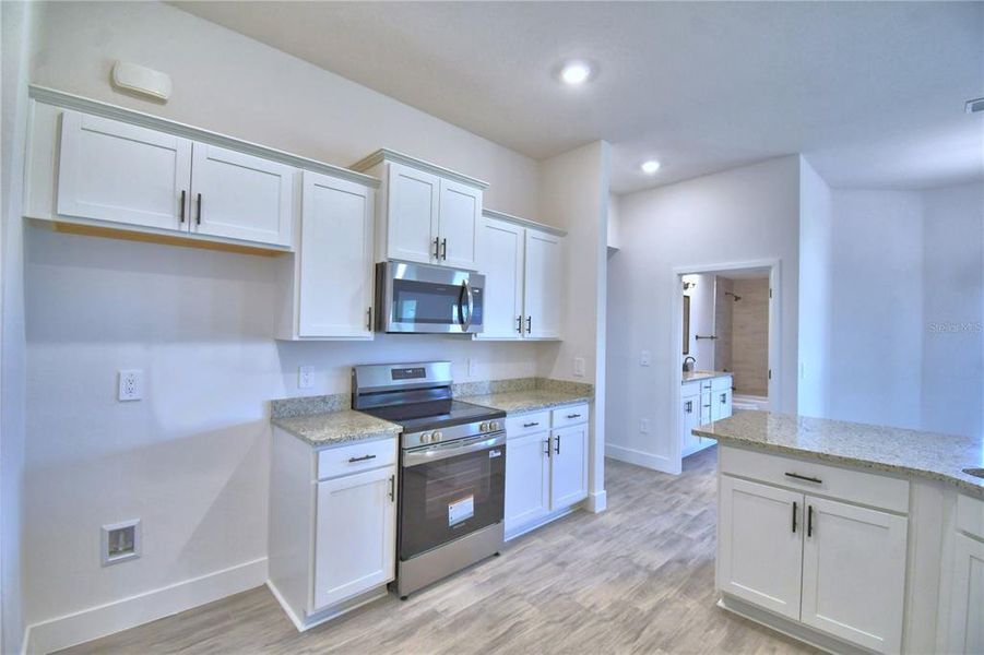 Furnished interior view inside a new home in Lake Juliana Estates, Auburndale (Image 4).
