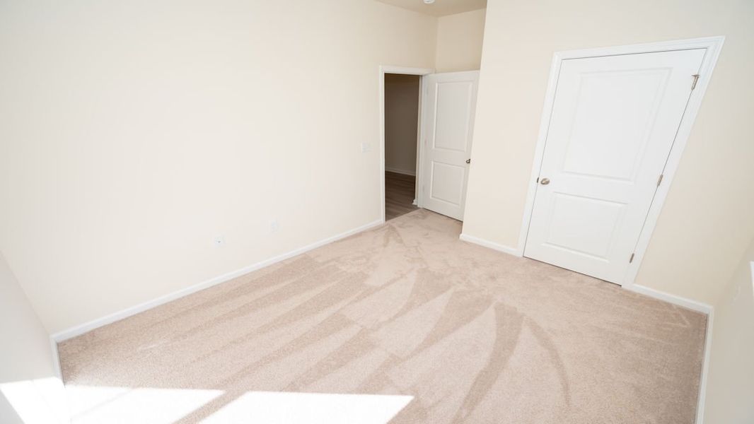 Representative unfurnished interior of a home built from the KERRY by D.R. Horton in The Reserve at Wild Horse, Conway (Image 18).