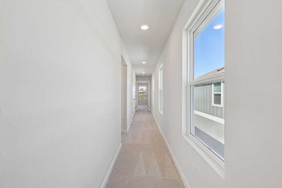 A hallway with windows.