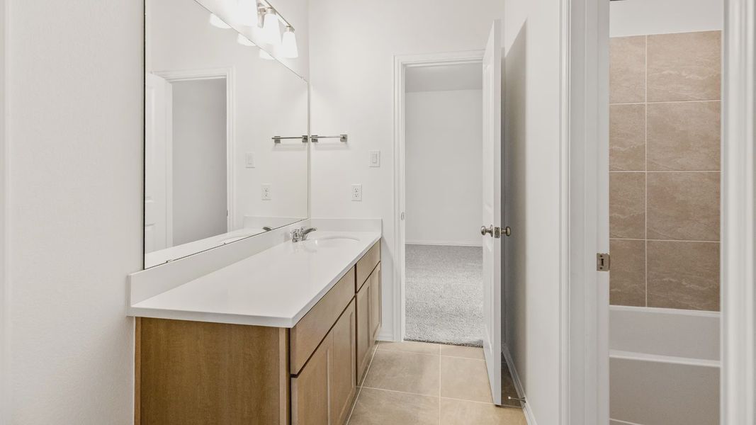 Furnished interior view inside a new home in Azalea, Pattison (Image 22).