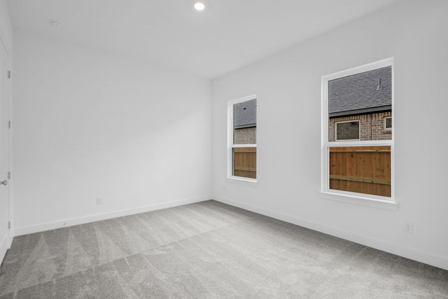 Spacious, unfurnished interior of a new home in Avalon at Friendswood 70s, Friendswood (Image 29).