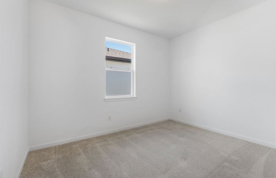 Spacious, unfurnished interior of a new home in Vida's Way, Wesley Chapel (Image 18).