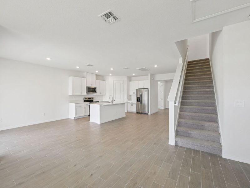 Spacious, unfurnished interior of a new home in Coasterra - Reserve Series, Palmetto (Image 9).