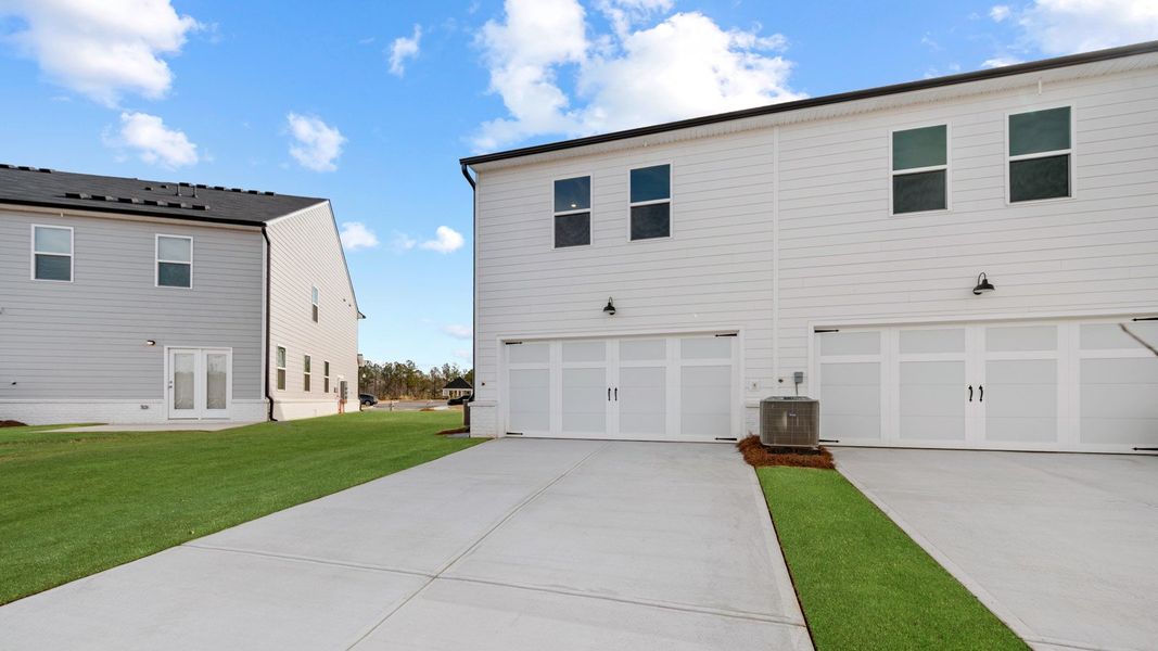 Exterior details and patio area of a home in Echo Glen, Stockbridge (Image 2).