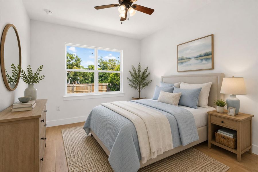Bedroom #2 with virtual staging facing the back of the home