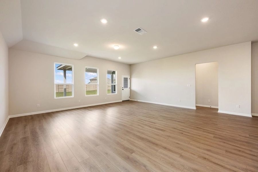 Spacious, unfurnished interior of a new home in The Colony 50s, Bastrop (Image 37).