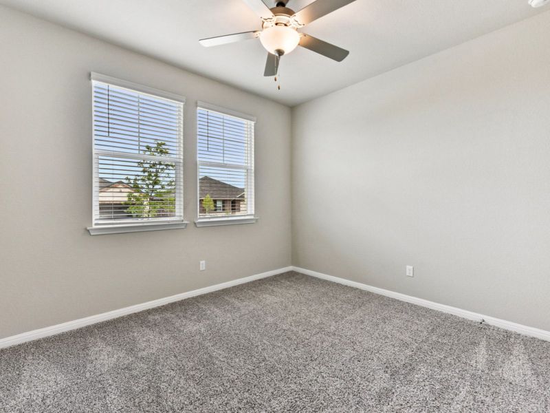 Spacious, unfurnished interior of a new home in Big Sky Ranch - Executive Collection, Dripping Springs (Image 15).