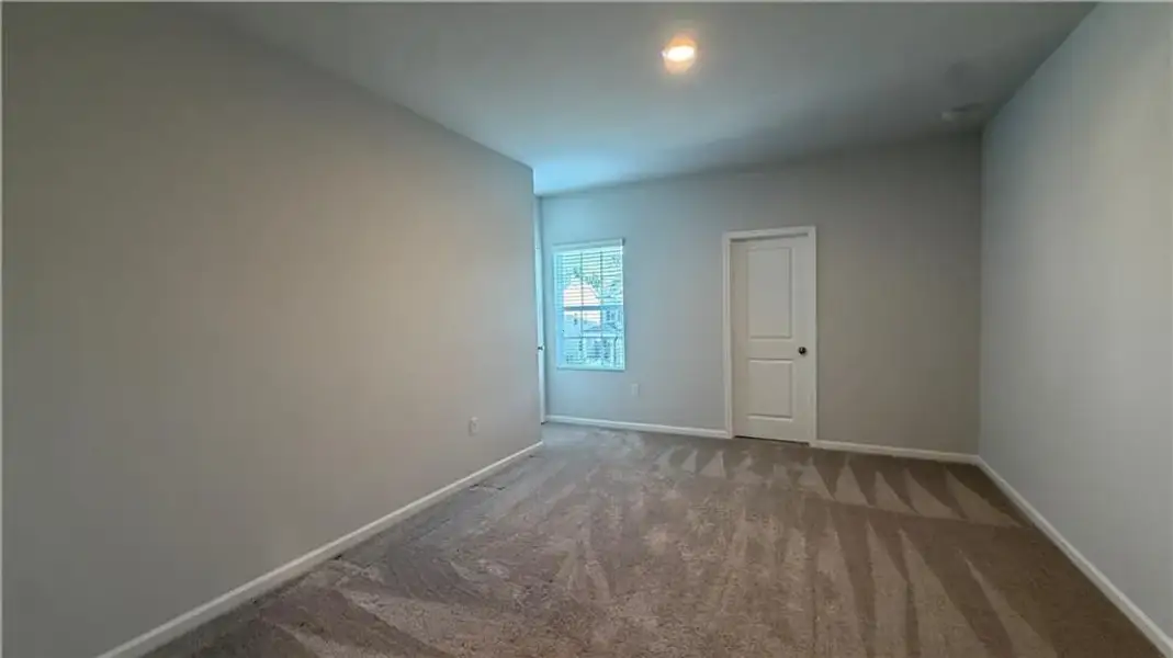 Spacious, unfurnished interior of a new home in Graystone Village, Grayson (Image 26).