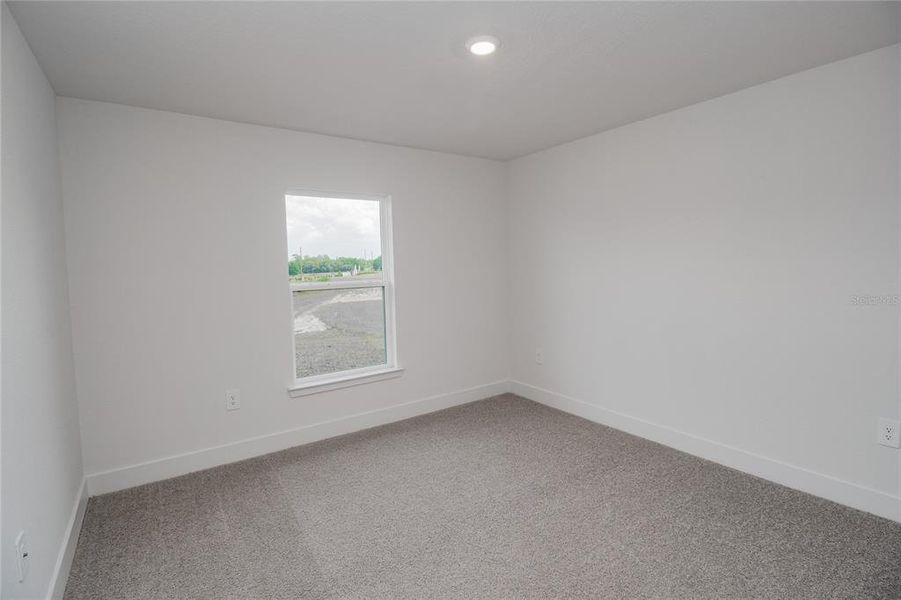 Spacious, unfurnished interior of a new home in Hickory Ridge Estates, Lake Wales (Image 25).