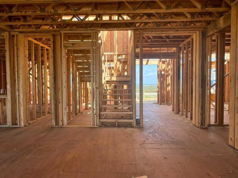 A look inside: Framing stage reveals the future open-concept living a grand entry. A look inside: Framing stage reveals the future open-concept living a grand entry.