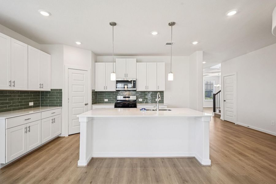 Photo is not of the actual home, but is an inspirational photo of builder’s model home and may depict options, furnishings, and/or decorator features that are not included