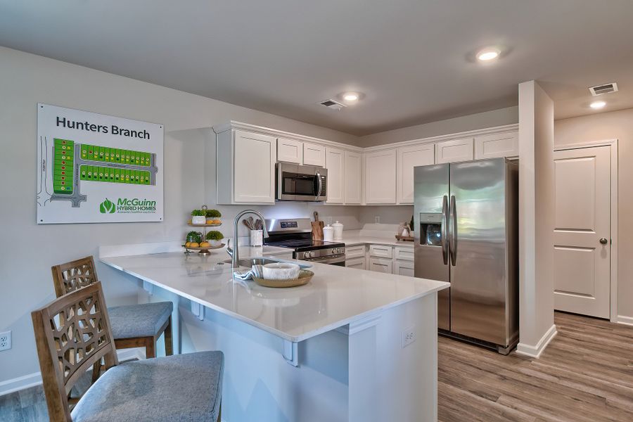 Representative furnished interior of a home built from the Poplar A by McGuinn Homes in Rivers Crossing, Aiken (Image 10).