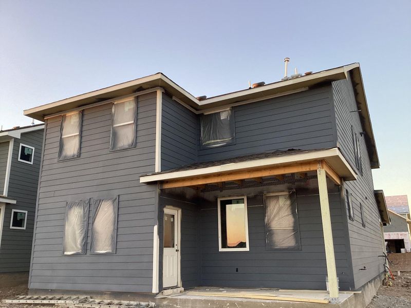 Exterior details and patio area of a home in The Homestead at Lariat, Liberty Hill (Image 4).