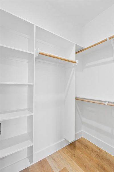 Discover a rare gem—a walk-in closet in the secondary bedroom, offering added storage and organization space, a coveted feature that enhances functionality and convenience.