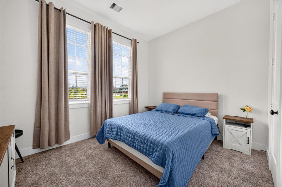 Furnished interior view inside a new home in , Iowa Colony (Image 30).