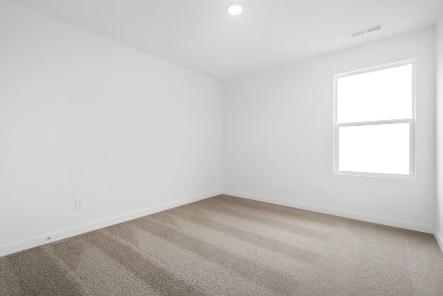 Spacious, unfurnished interior of a new home in Calista Farms, White House (Image 64).