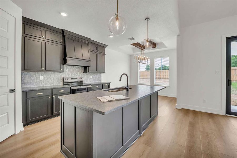 Please Note: These interior photos are not of the actual home but are of a completed one with a similar floor plan. Finishes, features, and layouts may vary.