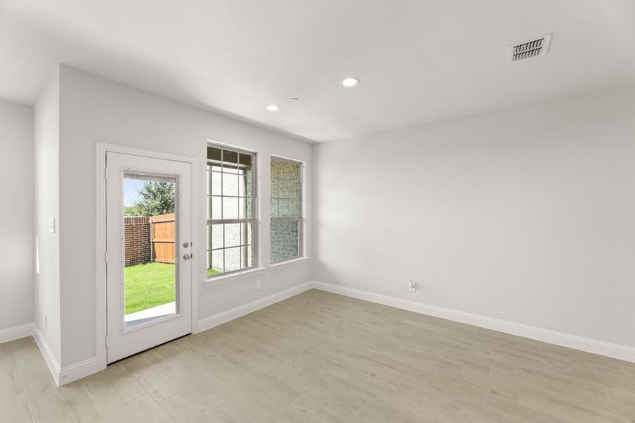 Front exterior of a new home in Main Street Village, Mansfield, TX, highlighting curb appeal (Image 14). Front exterior of a new home in Main Street Village, Mansfield, TX, highlighting curb appeal (Image 14).