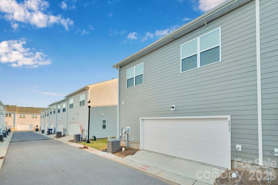 Exterior details and patio area of a home in Trellis at The Commons, Charlotte (Image 4). Exterior details and patio area of a home in Trellis at The Commons, Charlotte (Image 4).