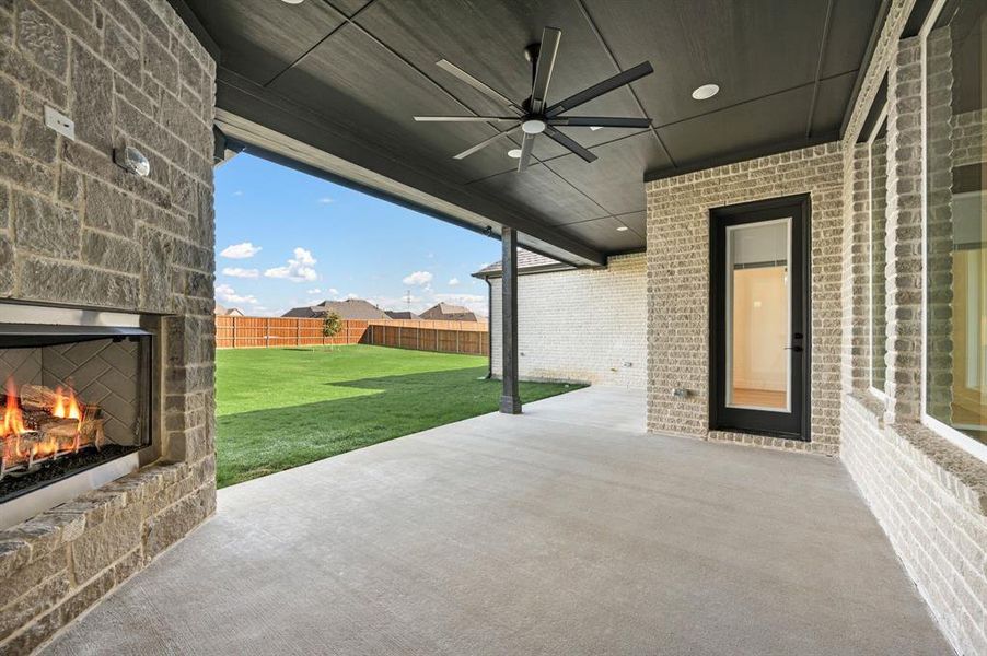 Exterior details and patio area of a home in NorthGlen, Haslet (Image 24).