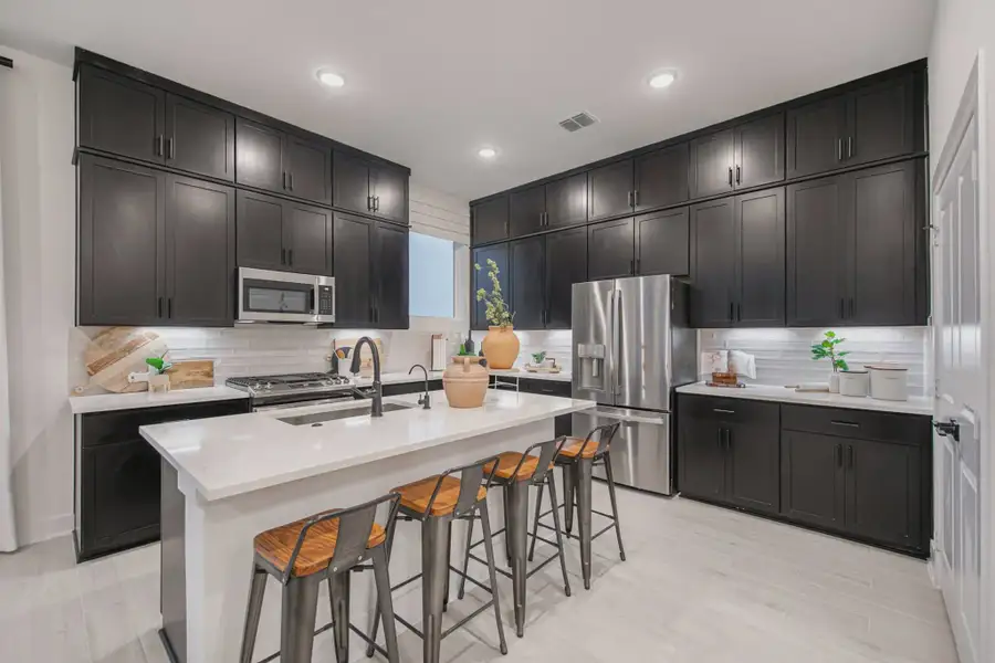 Representative furnished interior of a home built from the Athena by Chesmar Homes in Santa Rita Ranch, Liberty Hill (Image 4).
