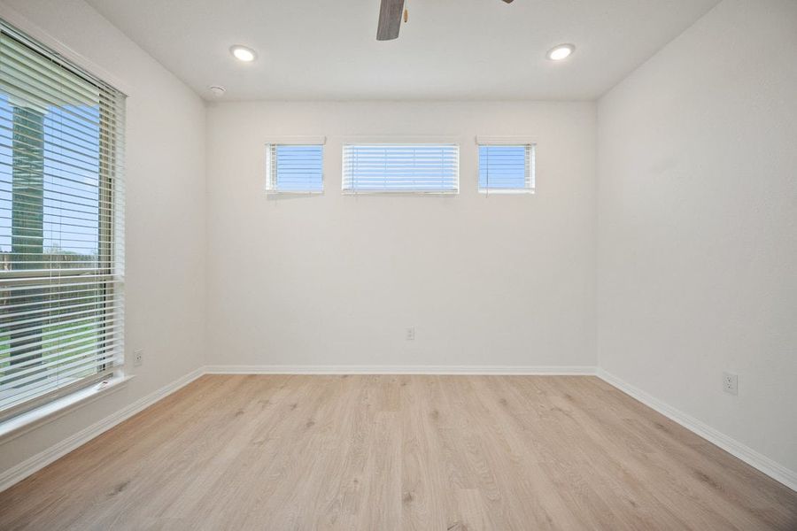 Spacious, unfurnished interior of a new home in The Hills of Bear Creek, Manchaca (Image 34).