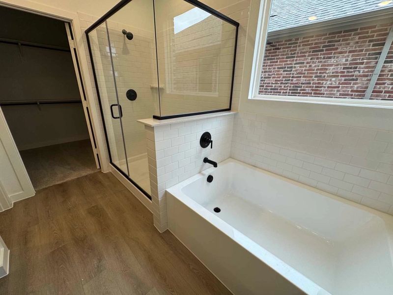 Primary Bathroom Construction Progress featuring the Noir Collection