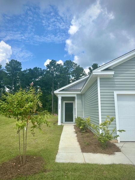 Front exterior of a new home in Watson Hill, Summerville, SC, highlighting curb appeal (Image 10). Front exterior of a new home in Watson Hill, Summerville, SC, highlighting curb appeal (Image 10).
