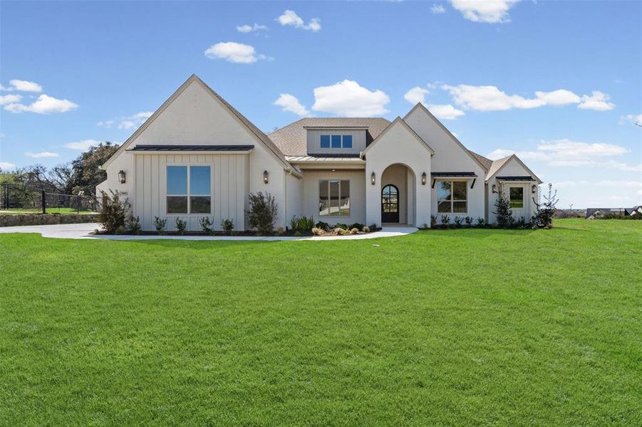 Front exterior of a new home in SouthBend Estates, Granbury, TX, highlighting curb appeal (Image 24).