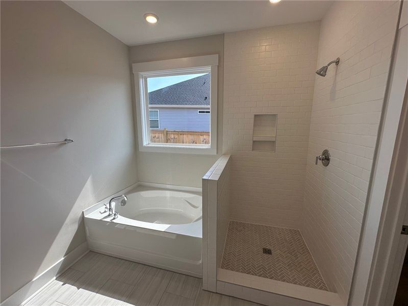 Bright and airy, this bath offers a tranquil retre