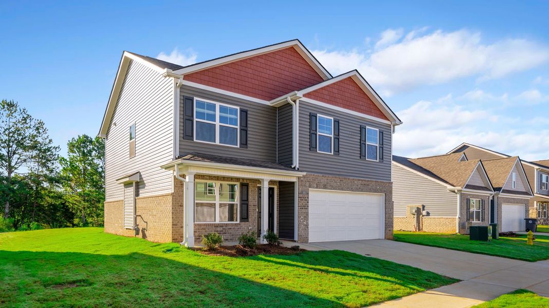 Front exterior of a new home in Price's Crossing, LaFayette, GA, highlighting curb appeal (Image 18). Front exterior of a new home in Price's Crossing, LaFayette, GA, highlighting curb appeal (Image 18).