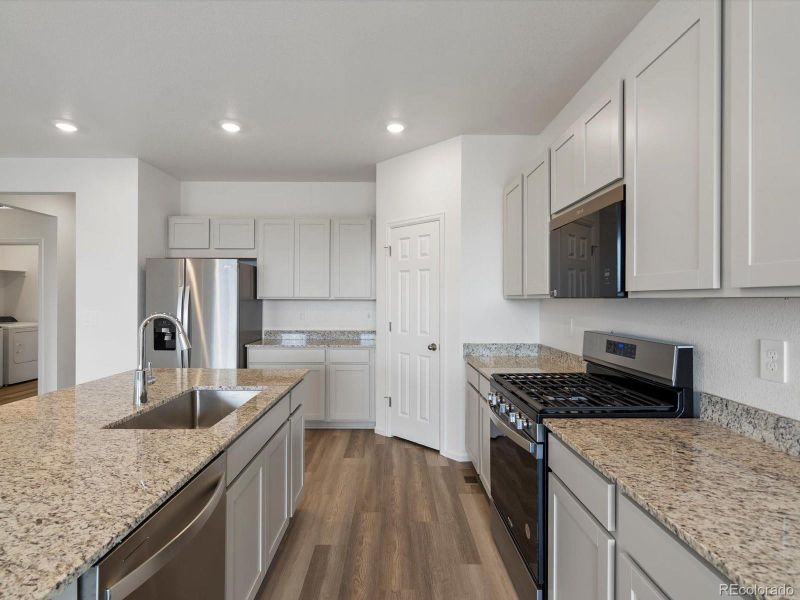 Furnished interior view inside a new home in Buffalo Highlands: The Canyon Collection, Commerce City (Image 9).