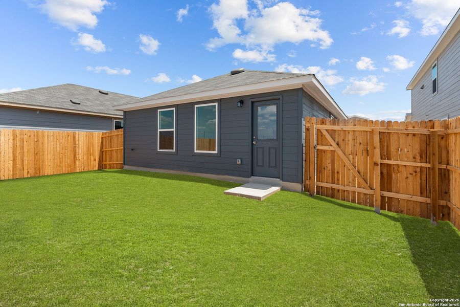 Exterior details and patio area of a home in Vista Real, Converse (Image 2).
