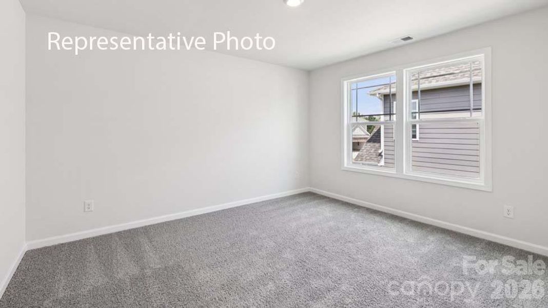 Spacious, unfurnished interior of a new home in Sanctuary at Southgate, Indian Trail (Image 19).