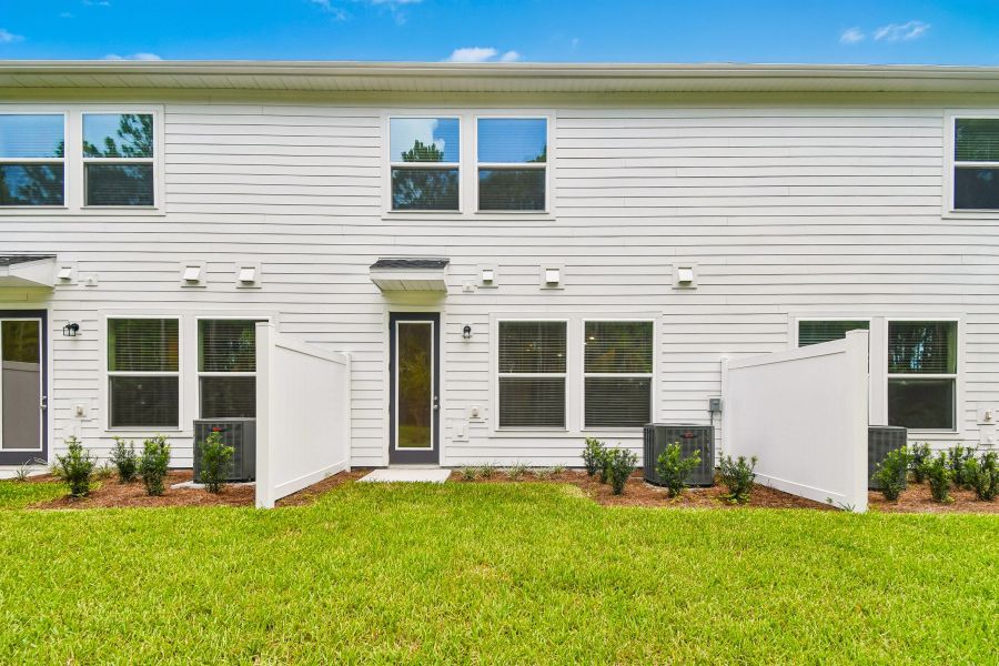 Exterior details and patio area of a home in Preserve at The Cays – The Harbor Series, Daytona Beach (Image 23).