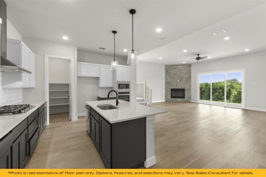 Representative furnished interior of a home built from the The Rio by Stonefield Homes in The Highlands, Rockwall (Image 11).